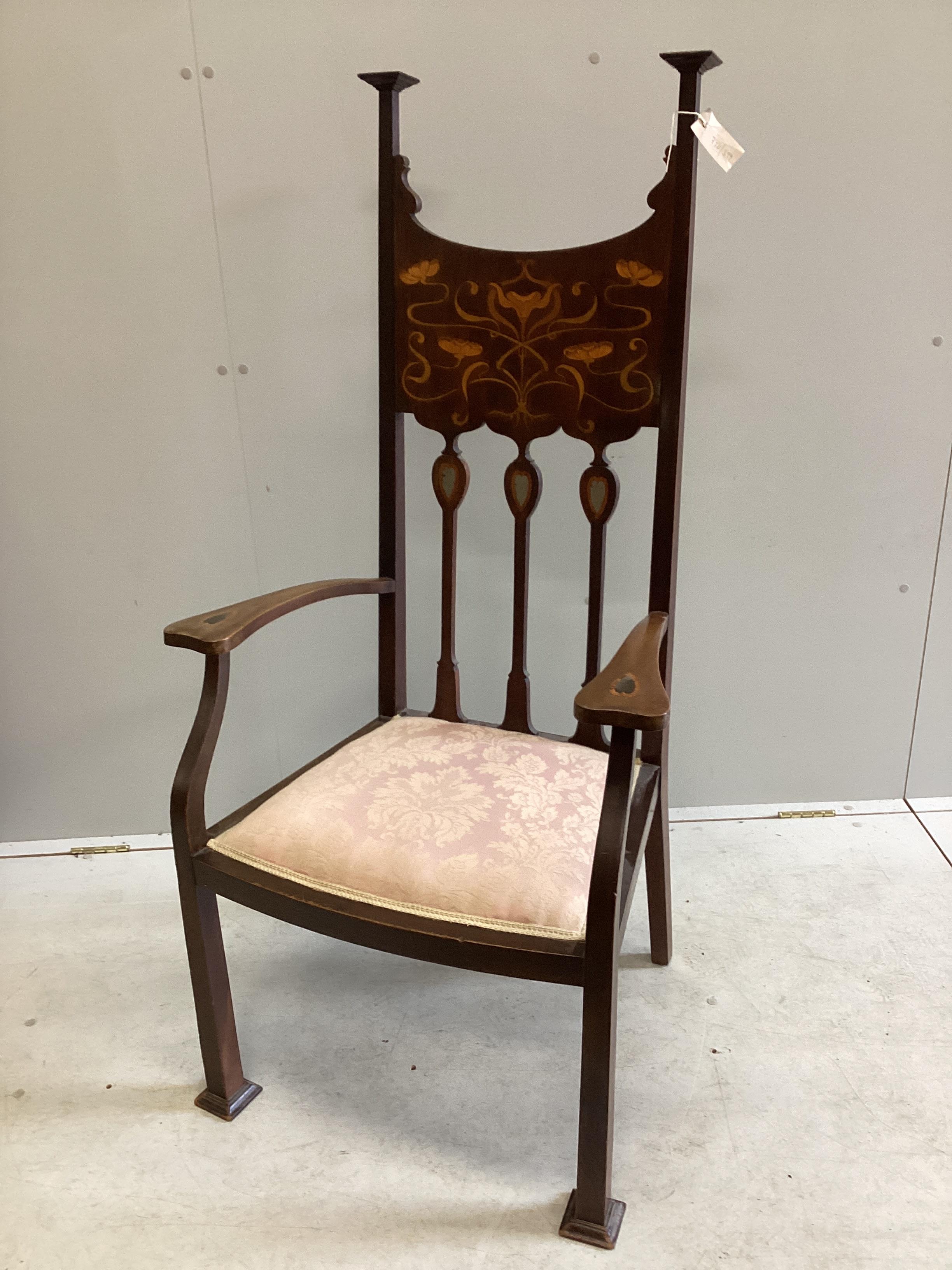 An Art Nouveau inlaid mahogany elbow chair in the manner of Shapland and Petter, width 65cm, depth 48cm, height 131cm